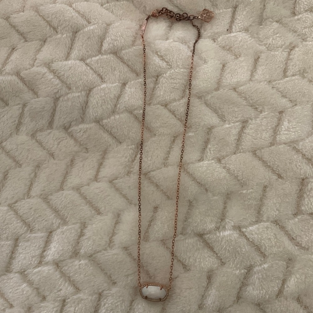 Kendra Scott necklace.